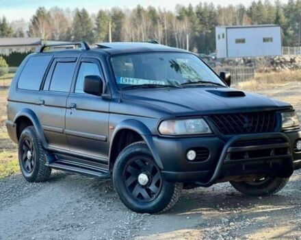 Черный Мицубиси Паджеро Спорт, объемом двигателя 2.5 л и пробегом 239 тыс. км за 2950 $, фото 1 на Automoto.ua