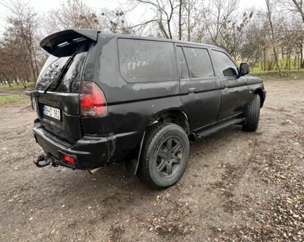 Чорний Міцубісі Паджеро Спорт, об'ємом двигуна 2.5 л та пробігом 402 тис. км за 4200 $, фото 3 на Automoto.ua
