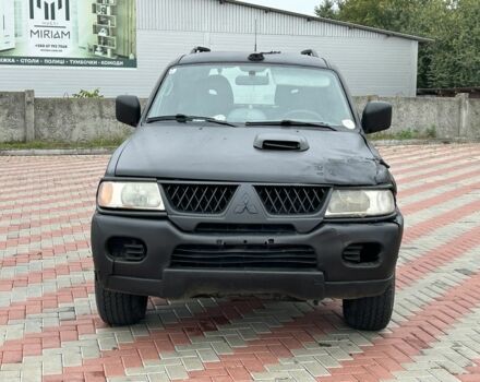 Чорний Міцубісі Паджеро Спорт, об'ємом двигуна 2.5 л та пробігом 220 тис. км за 2750 $, фото 7 на Automoto.ua