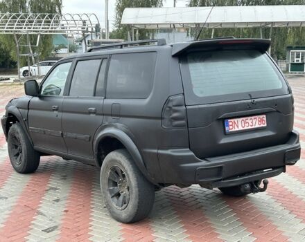 Чорний Міцубісі Паджеро Спорт, об'ємом двигуна 2.5 л та пробігом 220 тис. км за 2750 $, фото 2 на Automoto.ua