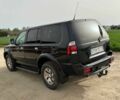 Чорний Міцубісі Паджеро Спорт, об'ємом двигуна 2.5 л та пробігом 308 тис. км за 4800 $, фото 4 на Automoto.ua