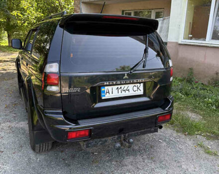 Чорний Міцубісі Паджеро Спорт, об'ємом двигуна 3 л та пробігом 303 тис. км за 9000 $, фото 1 на Automoto.ua