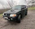 Чорний Міцубісі Паджеро Спорт, об'ємом двигуна 2.5 л та пробігом 402 тис. км за 4200 $, фото 1 на Automoto.ua