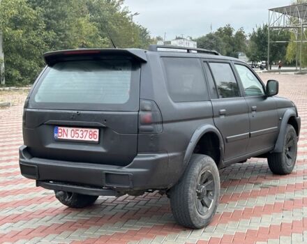 Чорний Міцубісі Паджеро Спорт, об'ємом двигуна 2.5 л та пробігом 220 тис. км за 2750 $, фото 4 на Automoto.ua