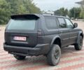 Чорний Міцубісі Паджеро Спорт, об'ємом двигуна 2.5 л та пробігом 220 тис. км за 2750 $, фото 4 на Automoto.ua