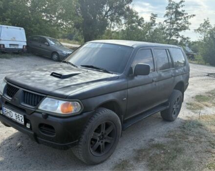 Черный Мицубиси Паджеро Спорт, объемом двигателя 2.5 л и пробегом 400 тыс. км за 4276 $, фото 2 на Automoto.ua