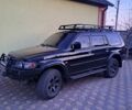 Черный Мицубиси Паджеро Спорт, объемом двигателя 3 л и пробегом 255 тыс. км за 9500 $, фото 2 на Automoto.ua