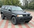 Чорний Міцубісі Паджеро Спорт, об'ємом двигуна 2.5 л та пробігом 220 тис. км за 2750 $, фото 6 на Automoto.ua