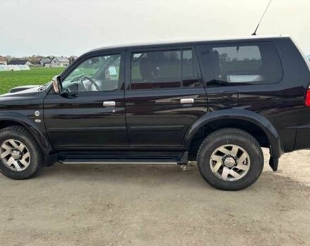 Чорний Міцубісі Паджеро Спорт, об'ємом двигуна 2.5 л та пробігом 308 тис. км за 4800 $, фото 6 на Automoto.ua