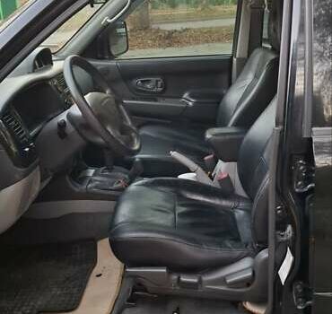 Чорний Міцубісі Паджеро Спорт, об'ємом двигуна 2.97 л та пробігом 215 тис. км за 7500 $, фото 14 на Automoto.ua