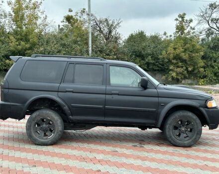 Чорний Міцубісі Паджеро Спорт, об'ємом двигуна 2.5 л та пробігом 220 тис. км за 2750 $, фото 5 на Automoto.ua