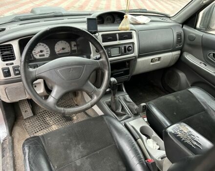 Чорний Міцубісі Паджеро Спорт, об'ємом двигуна 2.5 л та пробігом 220 тис. км за 2750 $, фото 10 на Automoto.ua