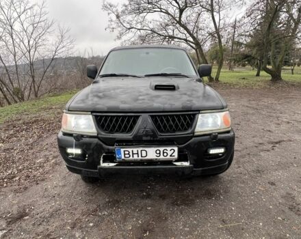 Чорний Міцубісі Паджеро Спорт, об'ємом двигуна 2.5 л та пробігом 402 тис. км за 4200 $, фото 1 на Automoto.ua