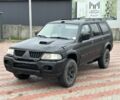 Чорний Міцубісі Паджеро Спорт, об'ємом двигуна 2.5 л та пробігом 220 тис. км за 2750 $, фото 1 на Automoto.ua