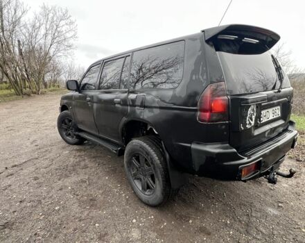 Чорний Міцубісі Паджеро Спорт, об'ємом двигуна 2.5 л та пробігом 402 тис. км за 4200 $, фото 4 на Automoto.ua