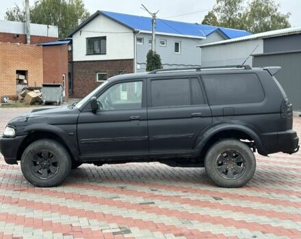 Чорний Міцубісі Паджеро Спорт, об'ємом двигуна 2.5 л та пробігом 220 тис. км за 2750 $, фото 1 на Automoto.ua