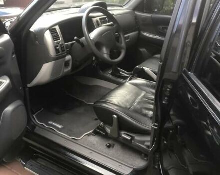 Черный Мицубиси Паджеро Спорт, объемом двигателя 2.5 л и пробегом 220 тыс. км за 10200 $, фото 5 на Automoto.ua