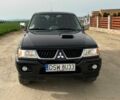Чорний Міцубісі Паджеро Спорт, об'ємом двигуна 2.5 л та пробігом 308 тис. км за 4800 $, фото 2 на Automoto.ua