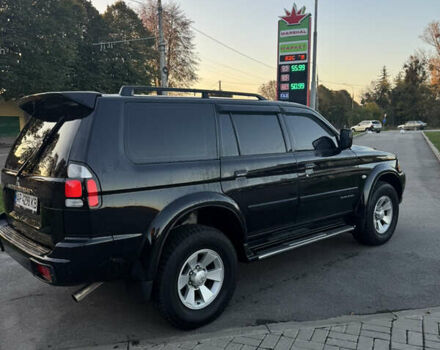 Черный Мицубиси Паджеро Спорт, объемом двигателя 2.97 л и пробегом 260 тыс. км за 7777 $, фото 5 на Automoto.ua