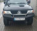 Черный Мицубиси Паджеро Спорт, объемом двигателя 2.5 л и пробегом 220 тыс. км за 10200 $, фото 1 на Automoto.ua