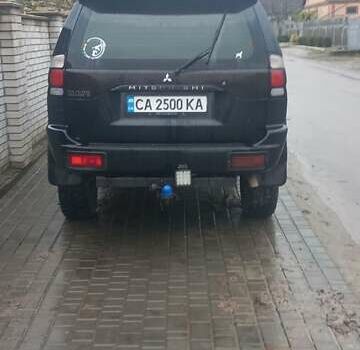 Черный Мицубиси Паджеро Спорт, объемом двигателя 2.5 л и пробегом 220 тыс. км за 10200 $, фото 2 на Automoto.ua