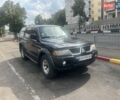 Чорний Міцубісі Паджеро Спорт, об'ємом двигуна 3 л та пробігом 300 тис. км за 6200 $, фото 1 на Automoto.ua