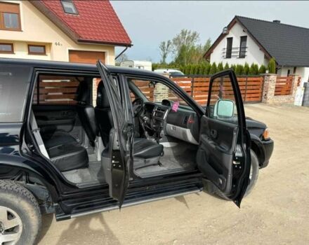 Чорний Міцубісі Паджеро Спорт, об'ємом двигуна 2.5 л та пробігом 308 тис. км за 4800 $, фото 10 на Automoto.ua