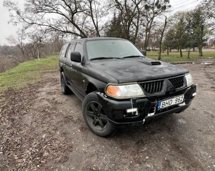 Чорний Міцубісі Паджеро Спорт, об'ємом двигуна 2.5 л та пробігом 402 тис. км за 4200 $, фото 2 на Automoto.ua