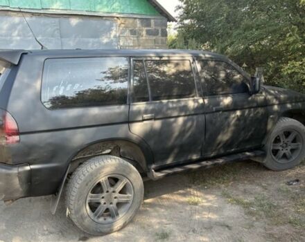 Черный Мицубиси Паджеро Спорт, объемом двигателя 2.5 л и пробегом 400 тыс. км за 4276 $, фото 1 на Automoto.ua