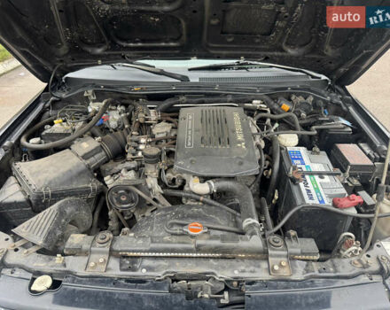 Черный Мицубиси Паджеро Спорт, объемом двигателя 3 л и пробегом 240 тыс. км за 8500 $, фото 13 на Automoto.ua