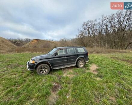 Черный Мицубиси Паджеро Спорт, объемом двигателя 3 л и пробегом 180 тыс. км за 8600 $, фото 4 на Automoto.ua