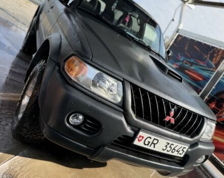 Чорний Міцубісі Паджеро Спорт, об'ємом двигуна 2.5 л та пробігом 3 тис. км за 7000 $, фото 7 на Automoto.ua
