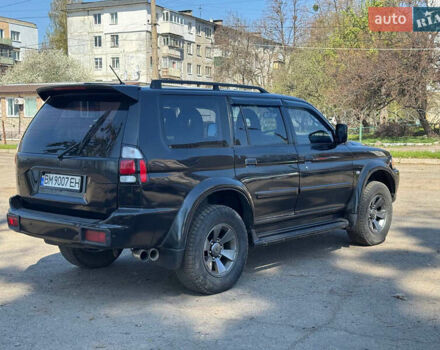 Чорний Міцубісі Паджеро Спорт, об'ємом двигуна 3 л та пробігом 195 тис. км за 8500 $, фото 1 на Automoto.ua
