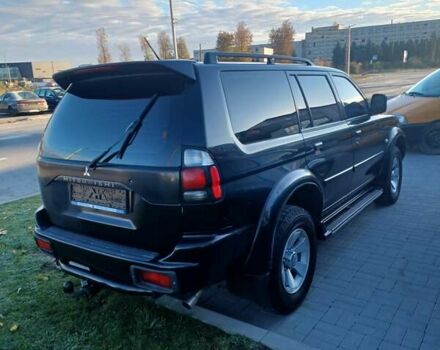 Чорний Міцубісі Паджеро Спорт, об'ємом двигуна 3.01 л та пробігом 310 тис. км за 8300 $, фото 4 на Automoto.ua