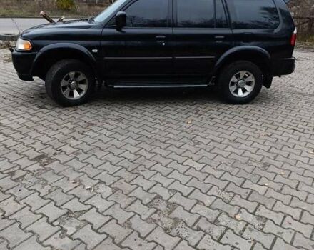 Чорний Міцубісі Паджеро Спорт, об'ємом двигуна 3 л та пробігом 238 тис. км за 8500 $, фото 7 на Automoto.ua