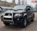 Чорний Міцубісі Паджеро Спорт, об'ємом двигуна 2.5 л та пробігом 345 тис. км за 9900 $, фото 1 на Automoto.ua