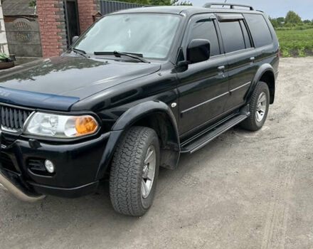 Черный Мицубиси Паджеро Спорт, объемом двигателя 3 л и пробегом 220 тыс. км за 8200 $, фото 2 на Automoto.ua