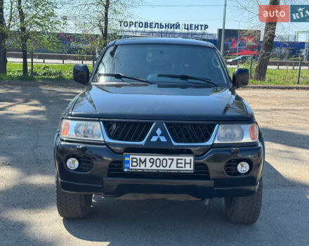 Чорний Міцубісі Паджеро Спорт, об'ємом двигуна 3 л та пробігом 195 тис. км за 8500 $, фото 5 на Automoto.ua