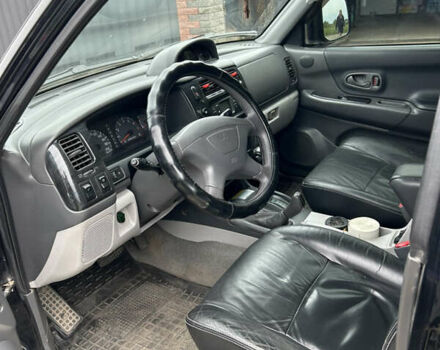 Черный Мицубиси Паджеро Спорт, объемом двигателя 3 л и пробегом 220 тыс. км за 8200 $, фото 6 на Automoto.ua