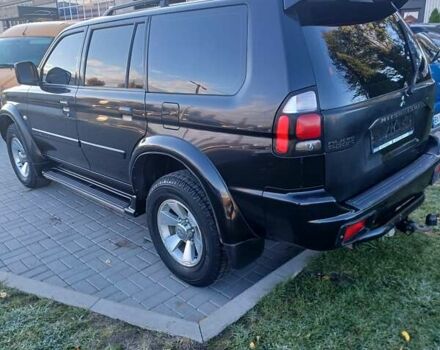 Чорний Міцубісі Паджеро Спорт, об'ємом двигуна 3.01 л та пробігом 310 тис. км за 8300 $, фото 6 на Automoto.ua