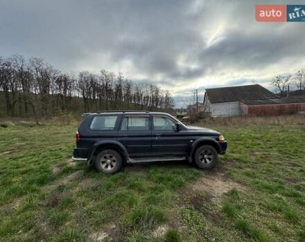 Черный Мицубиси Паджеро Спорт, объемом двигателя 3 л и пробегом 180 тыс. км за 8600 $, фото 3 на Automoto.ua