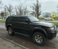 Чорний Міцубісі Паджеро Спорт, об'ємом двигуна 3 л та пробігом 275 тис. км за 7500 $, фото 4 на Automoto.ua
