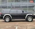 Чорний Міцубісі Паджеро Спорт, об'ємом двигуна 2.5 л та пробігом 345 тис. км за 9900 $, фото 6 на Automoto.ua