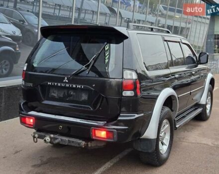 Чорний Міцубісі Паджеро Спорт, об'ємом двигуна 2.5 л та пробігом 345 тис. км за 9900 $, фото 5 на Automoto.ua