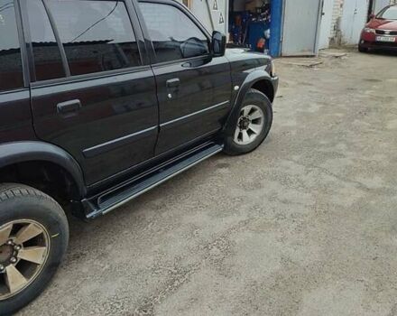 Черный Мицубиси Паджеро Спорт, объемом двигателя 2.97 л и пробегом 218 тыс. км за 8999 $, фото 1 на Automoto.ua