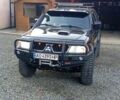 Чорний Міцубісі Паджеро Спорт, об'ємом двигуна 2.5 л та пробігом 279 тис. км за 13000 $, фото 3 на Automoto.ua