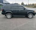 Чорний Міцубісі Паджеро Спорт, об'ємом двигуна 3 л та пробігом 200 тис. км за 8300 $, фото 5 на Automoto.ua