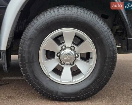 Чорний Міцубісі Паджеро Спорт, об'ємом двигуна 2.5 л та пробігом 345 тис. км за 9900 $, фото 16 на Automoto.ua