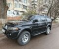 Чорний Міцубісі Паджеро Спорт, об'ємом двигуна 3 л та пробігом 275 тис. км за 7500 $, фото 1 на Automoto.ua