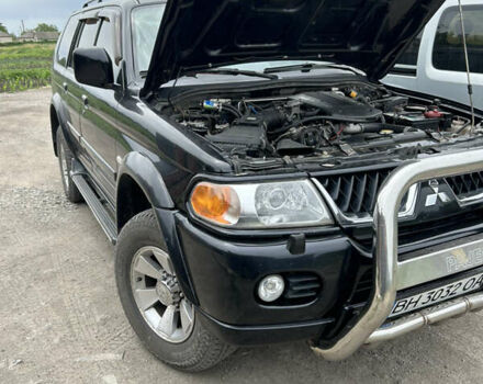 Черный Мицубиси Паджеро Спорт, объемом двигателя 3 л и пробегом 220 тыс. км за 8200 $, фото 4 на Automoto.ua